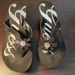 GUESS black platform wedge sandals size 9